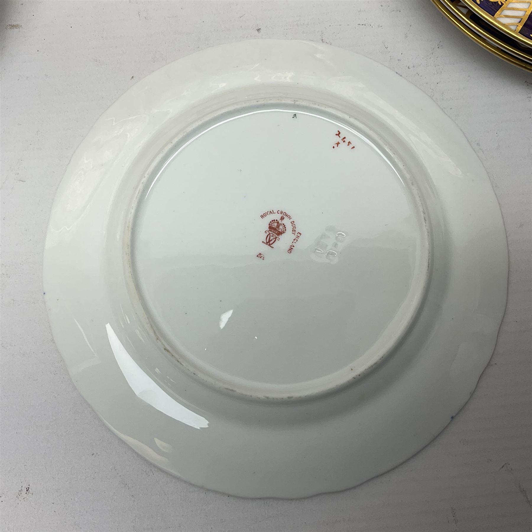 Ten Royal Crown Derby plates all in imari pattern 2451, in various sizes, comprising five D15.5cm, four D18cm and one D23cm