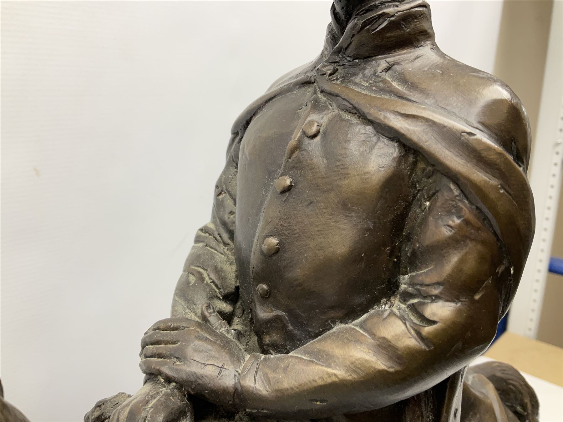 Large and impressive bronze figure of Wellington seated on a horse, on a sarcophogus shaped stepped base impressed 'Meunier Paris', the canted corners inset with battle trophies H68cm L50cm D22cm