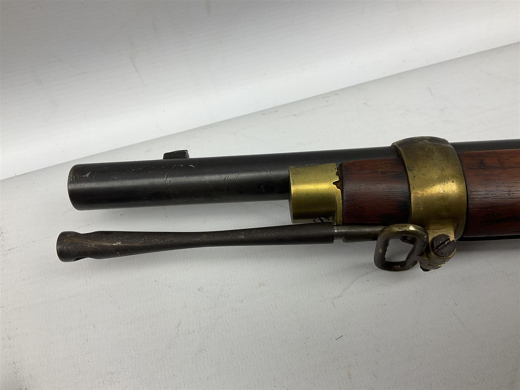 Manton .577/450 Martini Henry rifle, the 82.5cm smooth bored barrel proofed for shot, two barrel bands and bayonet fitting, engraved action with side safety, figured walnut stock with chequered steel butt plate, complete with ramrod, NVN other than 5346 on barrel, L125cm