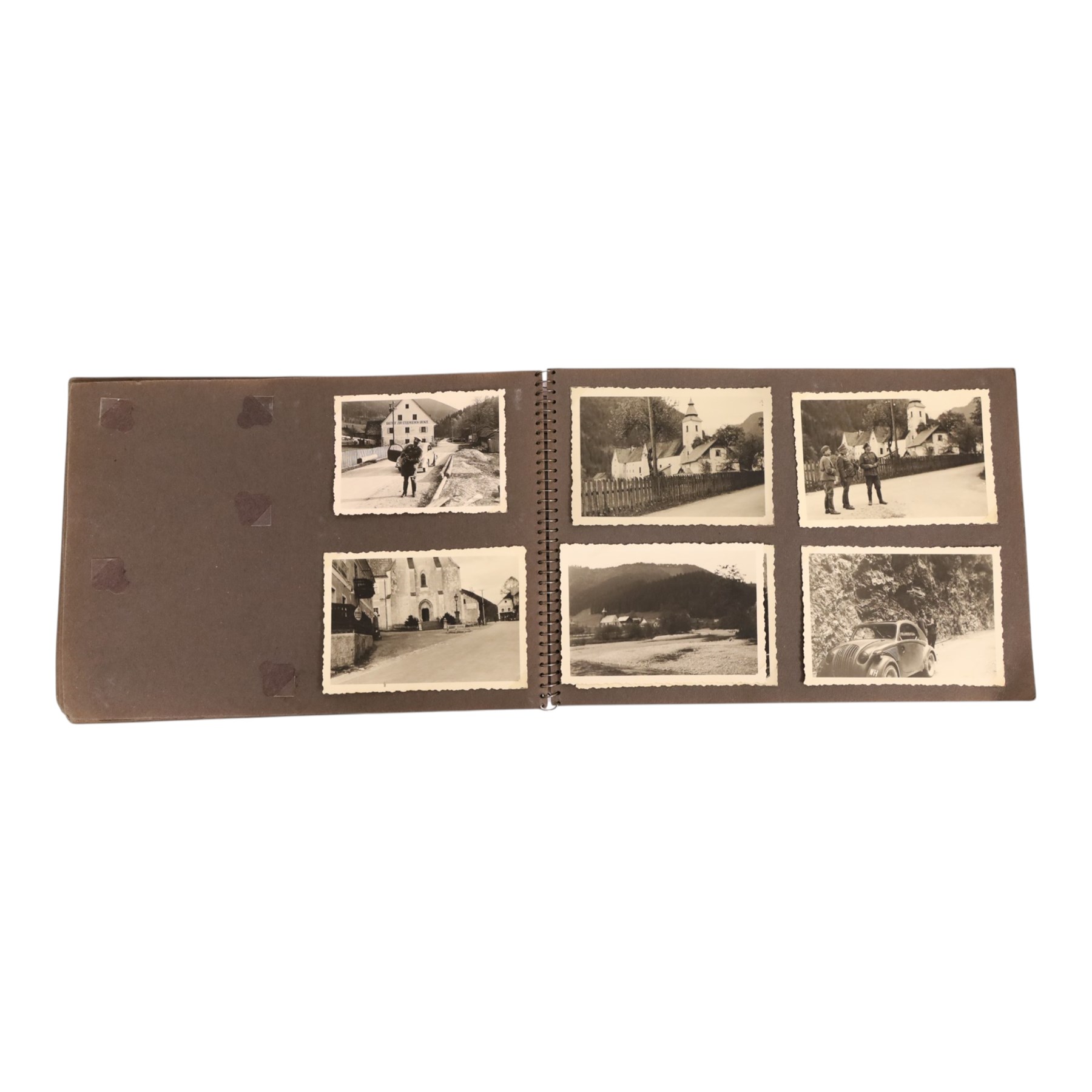 WWII German Soldiers photo album, 1942, including photographs of soldiers in uniform posing during parade etc  