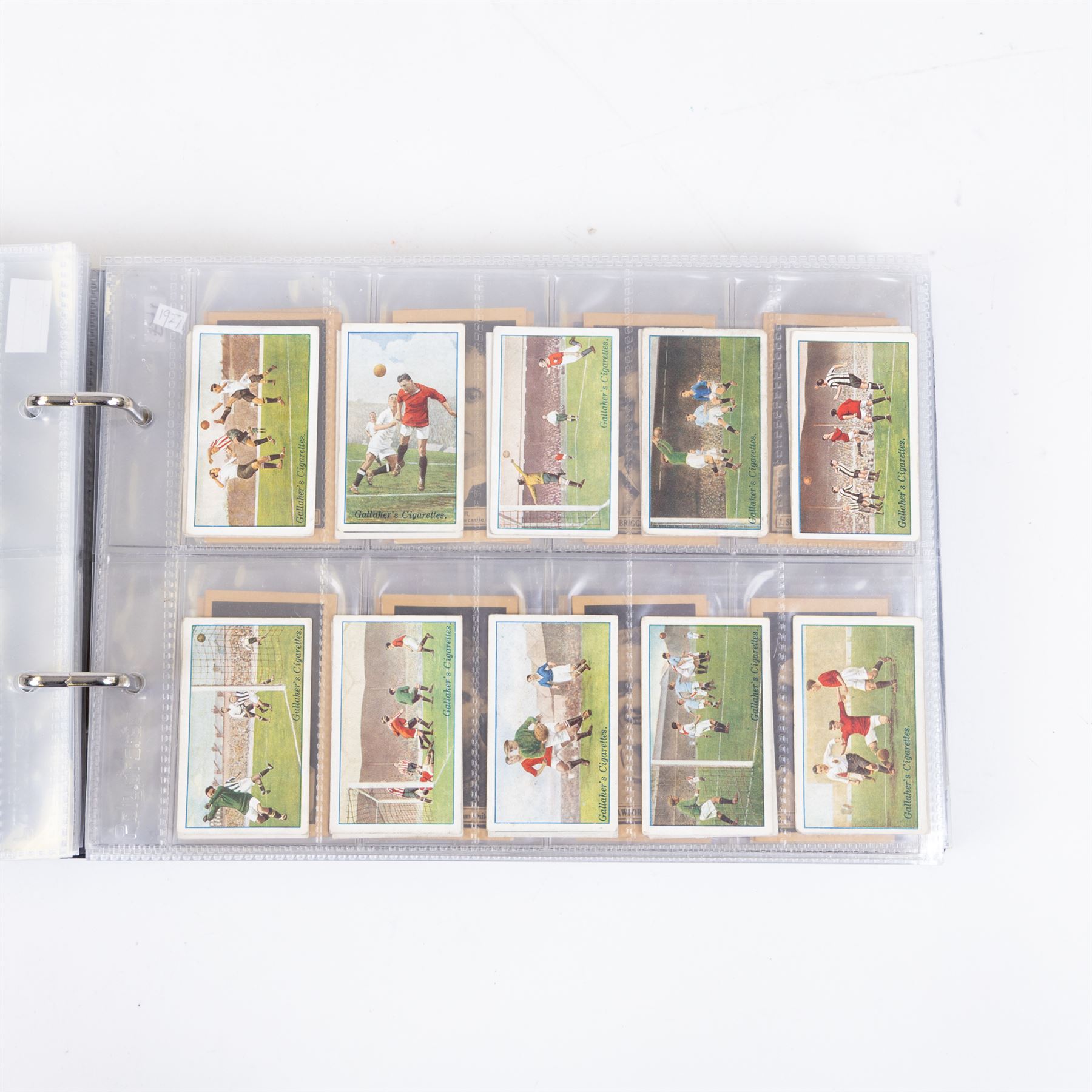 Collection of Edwardian and later Football related trading and cigarette cards, including forty-nine of fifty 1906 Ogden's Football Club Colours, 1922 PALS Footall series, ninety of one hundred 1925 Gallaher Famous Footballers, complete set of forty-four 1926 Ogden's Captains of Association Football Clubs and Colours, complete set of fifty 1927 Players Football Caricatures by MAC,  complete set of fifty 1927 Players Football Caricatures by RIP,  complete set of fifty 1930 Players Association Cup Winners, complete set of 50 1933 Ogdens AFC Nicknames etc, housed in brown cigarette card album