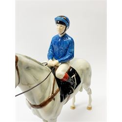A limited edition John Beswick jockey on horseback, marked beneath, no 097/250, H28.5cm. 