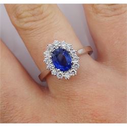 18ct white gold fine oval Ceylon sapphire and round brilliant cut diamond cluster ring, stamped 750, sapphire approx 1.40 carat