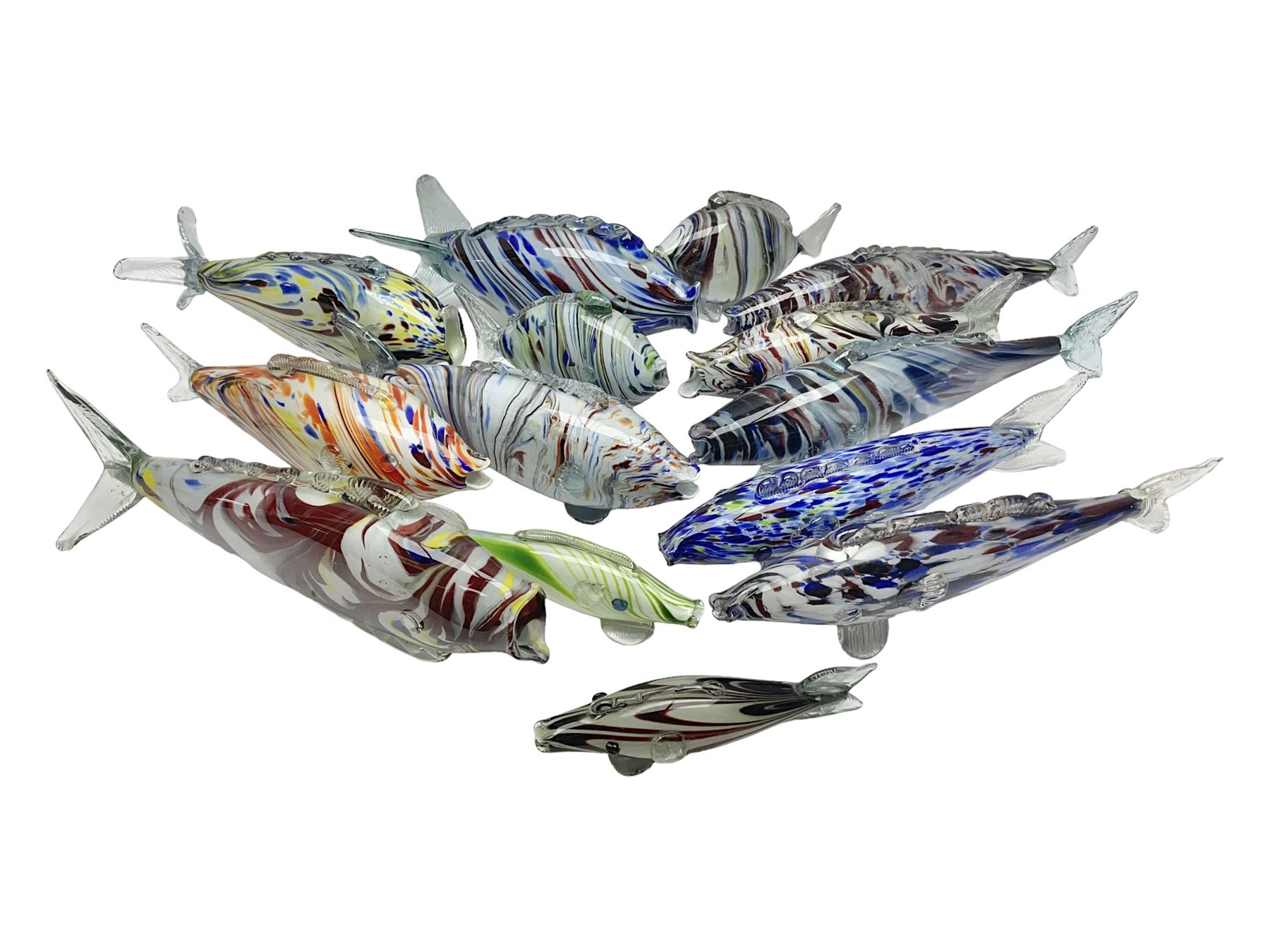 Collection of mid 20th century murano style glass fish, each with multi coloured inclusions largest L42cm