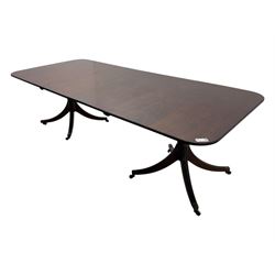 Regency design mahogany twin pillar dining table, two additional leaves, on turned supports with four out-splayed supports 