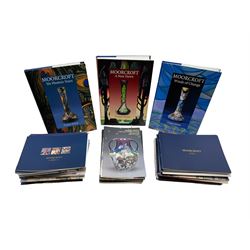 Three Moorcroft reference books, comprising Winds of Change, The Phoenix Years and A New Dawn, together with a collection of Moorcroft magazines 