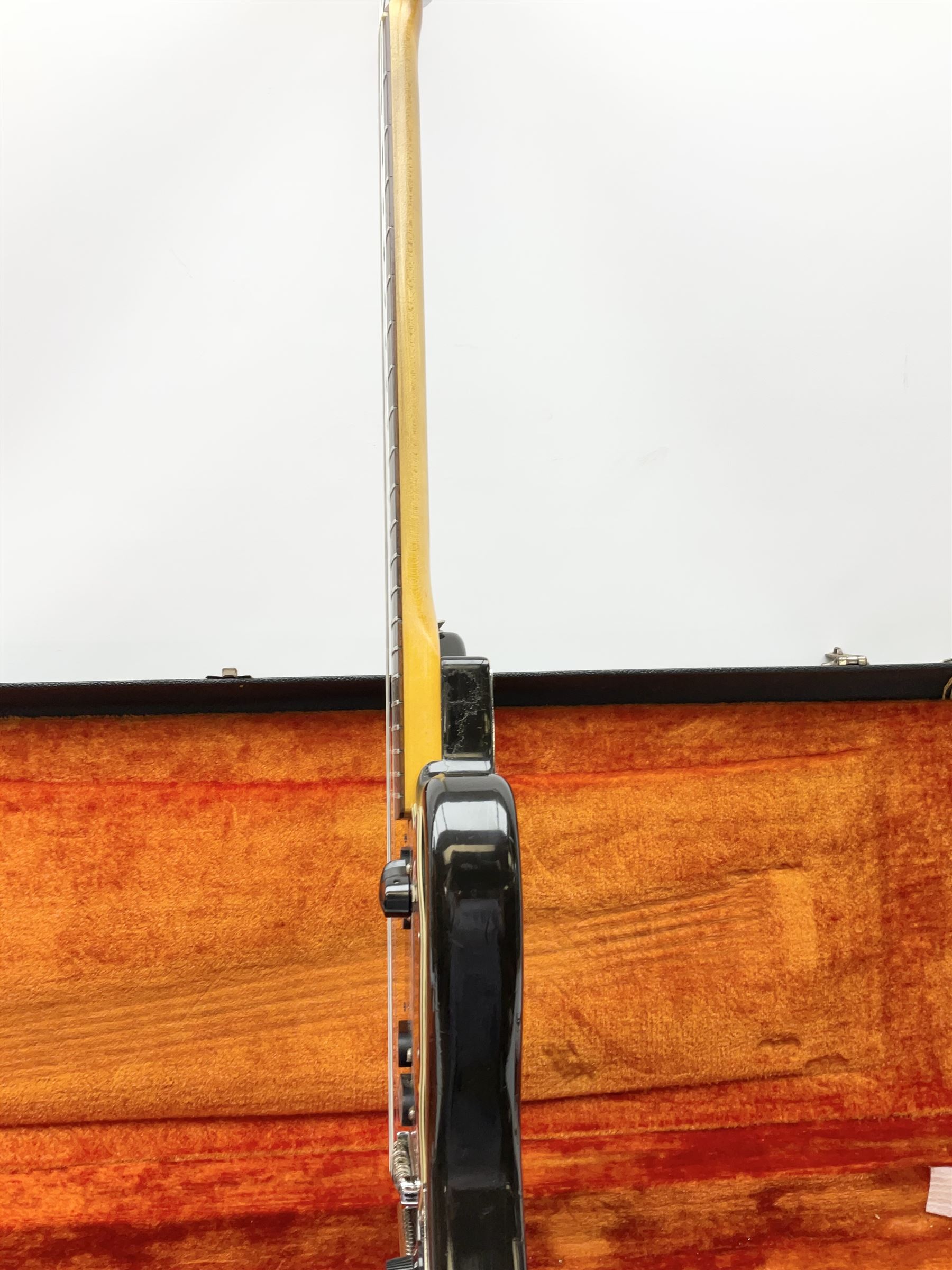 Fender three-tone Sunburst 12-string electric guitar c1965/6 Fullerton USA, with alder body and maple neck, the Indian rosewood fretboard with twenty-one frets and pearloid dot markers, fender electric XII bridge, F-stamp tuners (non-original), two split single coil pick-ups, master volume and tone and four-way switch, serial no.129730, L108cm; in original Fender case bearing label for Rivington Guitars New York with copy of original invoice; together with GuitarKes set-up and service certificate dated October 2021
