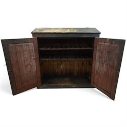 19th century painted and lacquered pine clerks desk bureau on cupboard, hinged fall-front enclosing three compartments, over slatted panelled doors enclosing two perforated shelves, on skirted base, in rustic forest green and red finish