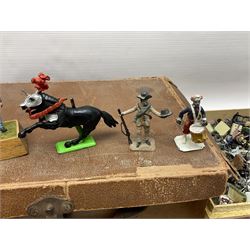 Large variety of predominantly metal miniature soldiers, a mixture of painted and non-painted figures, to include examples of American, British and European soldiers 