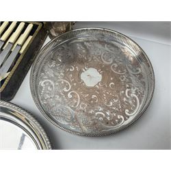Silver plated twin handled hors d'oeuvres tray with six glass serving dishes, together with three silver plated tureens with covers, coffee pot and a set of cased cutlery with ivorine handles etc