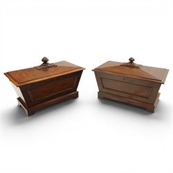 Thomas & George Seddon (1815-1870) - Pair of mid-19th mahogany cellarettes of sarcophagus form, the hinged and panelled top surmounted by a gadrooned and lappet carved knop, surrounded by a moulded edge, enclosing a lead lined wine cooler interior to one, the other paper lined, lower moulded edge over bracket feet and castors