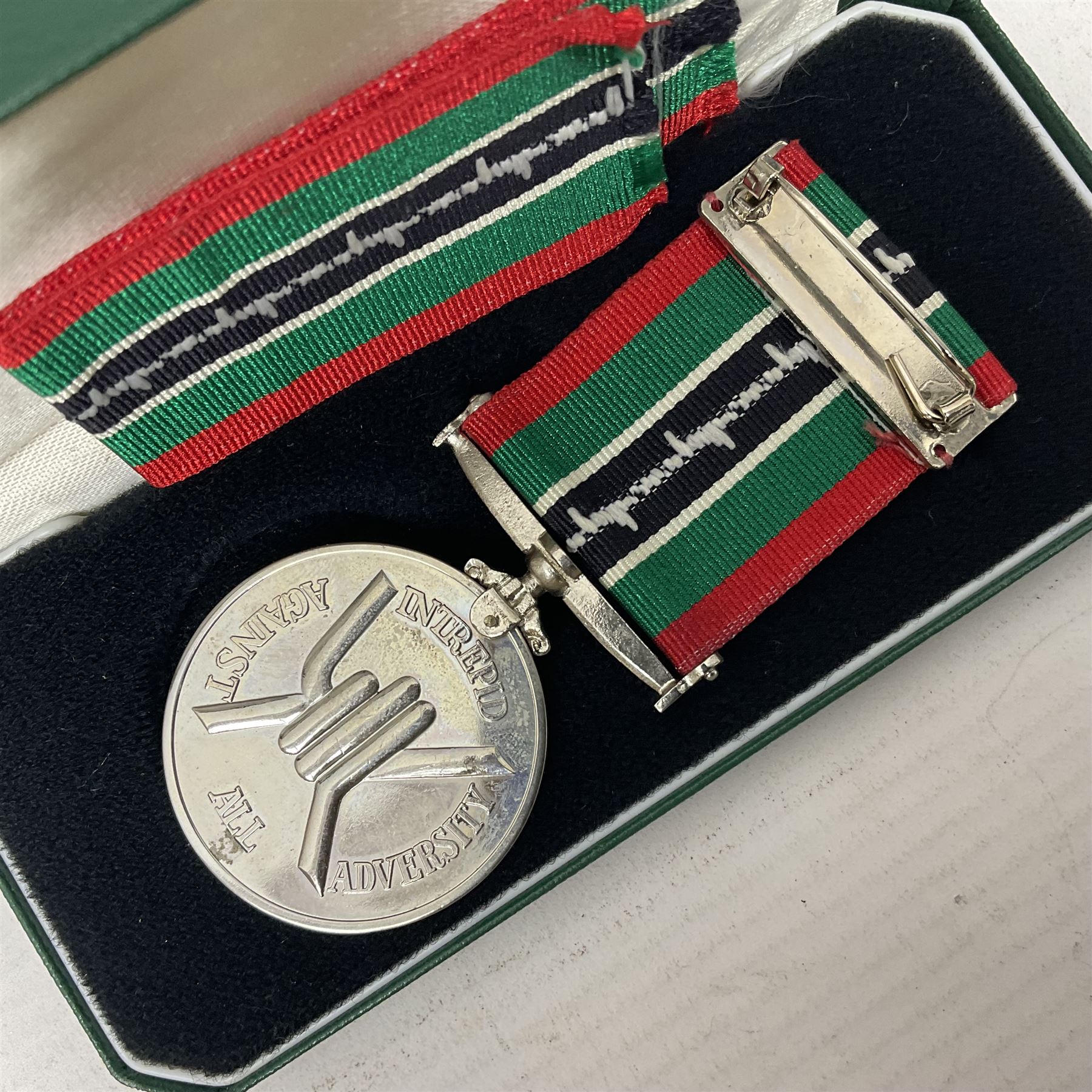 Two Imperial Service Medals to Elsie Hannah Ferguson and Fred Whitehead; each in original case; WWI Special Constabulary Medal to Inspr. Alfred W. Thompson; modern Prisoner of War Medal; cased; replica Victoria Cross and India Mutiny Medals with archive of information relating to Pte. Robert Newell V.C. 9th Lancers; replica Victoria Cross and George Cross with miniatures; and other replica medals etc