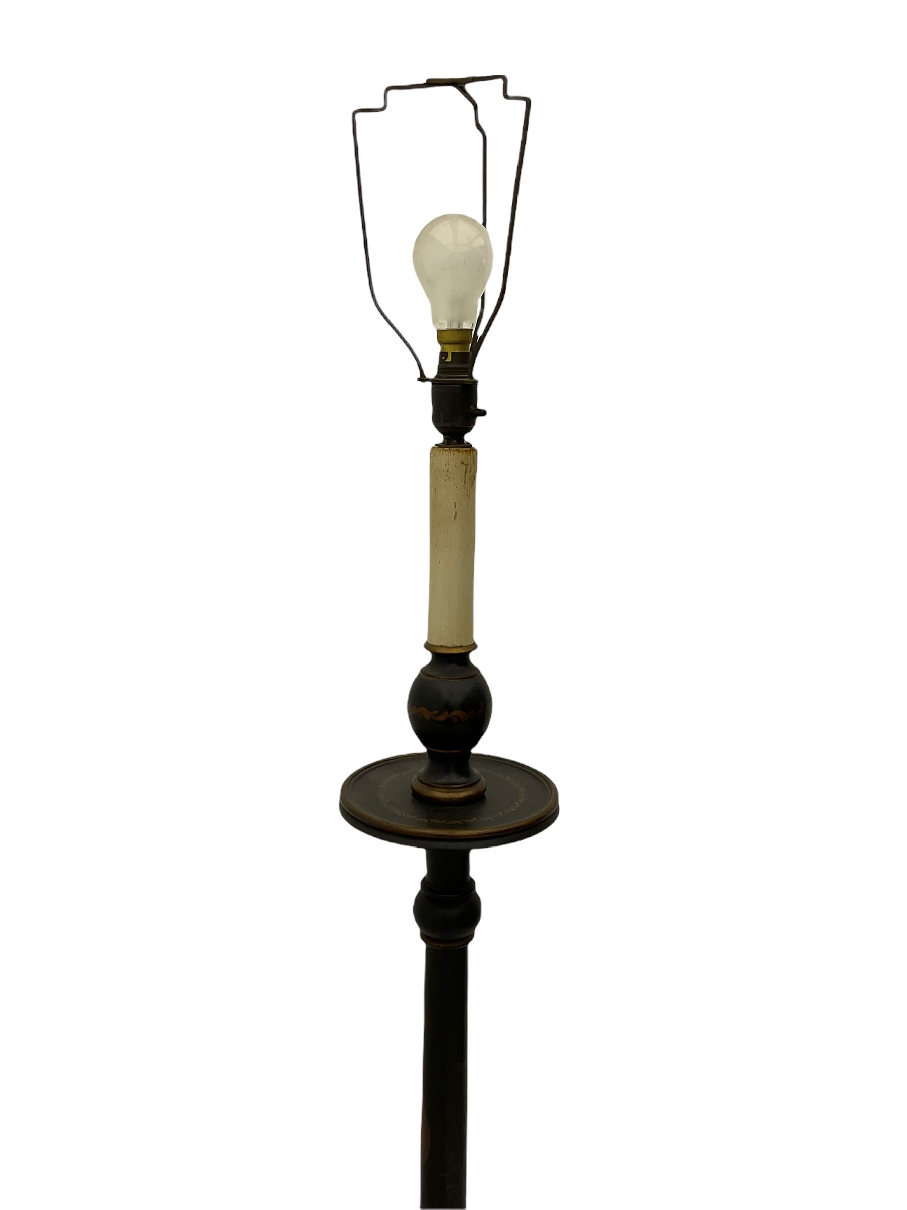 Late 20th century chinoiserie standard lamp, the circular base decorated with raised gilt figural scenes, H153cm (measurement excluding shade and fitting)