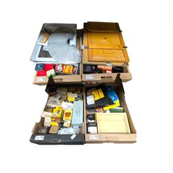 Collection of photography and photograph development accessories, including bulbs, develop...