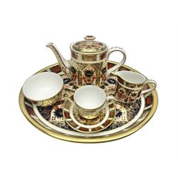 Royal Crown Derby Imari pattern miniature cabaret set, comprising tray, teapot, milk jug, sucrier, teacup and saucer