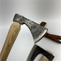 Swedish hunting axe the head marked Gransfors-Bruk, the ash handle with bun pommel and leather head cover, L45cm; and another similar unmarked hunting axe (2)