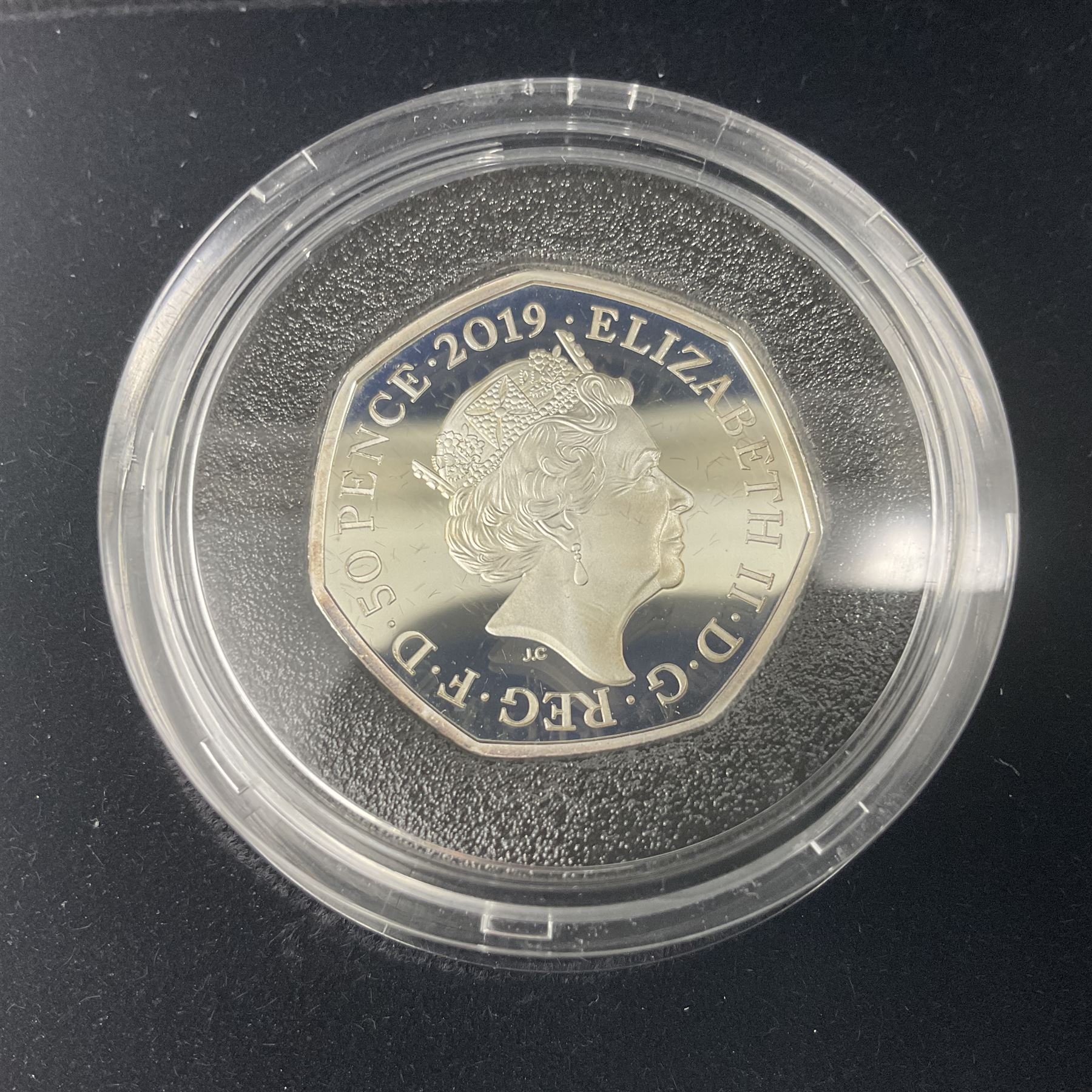 Three The Royal Mint United Kingdom silver proof piedfort fifty pence coins, comprising 2017 'Sir Isaac Newton', 2019 'A Celebration of Sherlock Holmes' and 'Celebrating the Life of Stephen Hawking', all cased with certificates 