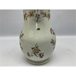 Large 18th century Bristol porcelain sparrow beak jug, circa 1770-1775, of baluster form with grooved strap handle, decorated with hand painted floral sprays and sprigs beneath a floral swag suspended from a blue band, with paper label beneath detailed Bayley Collection Bristol, H22cm