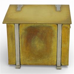 Early 20th century brass coal box, square hinged lid with recessed rectangular handle plates, the front fitted with a swing carrying handle, opening to a removable blackened metal liner, raised on short bracket feet