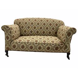 Early 20th century two seat drop arm sofa, and pair of matching armchairs, upholstered in beige patterned fabric