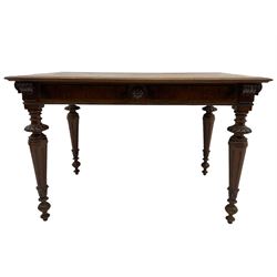 Victorian walnut centre table, rectangular top, figured side rails with carved motif, turned tapering leg