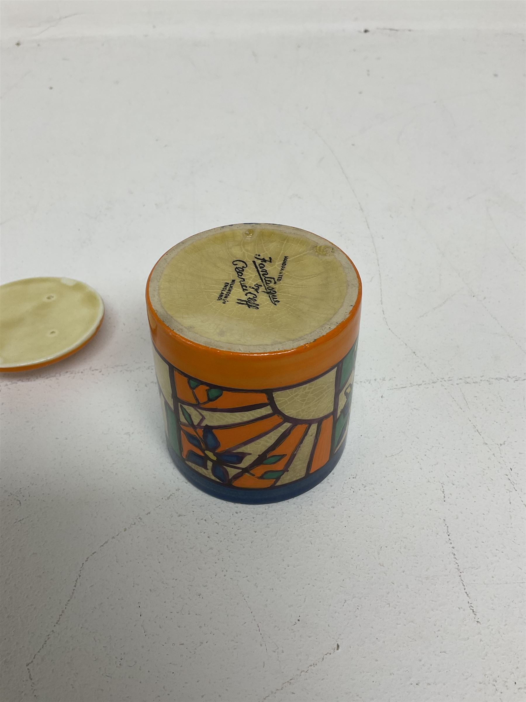 Clarice Cliff Fantasque for Wilkinson Pottery preserve pot, circa 1928, of drum form decorated in Sunray Leaves pattern, H8cm