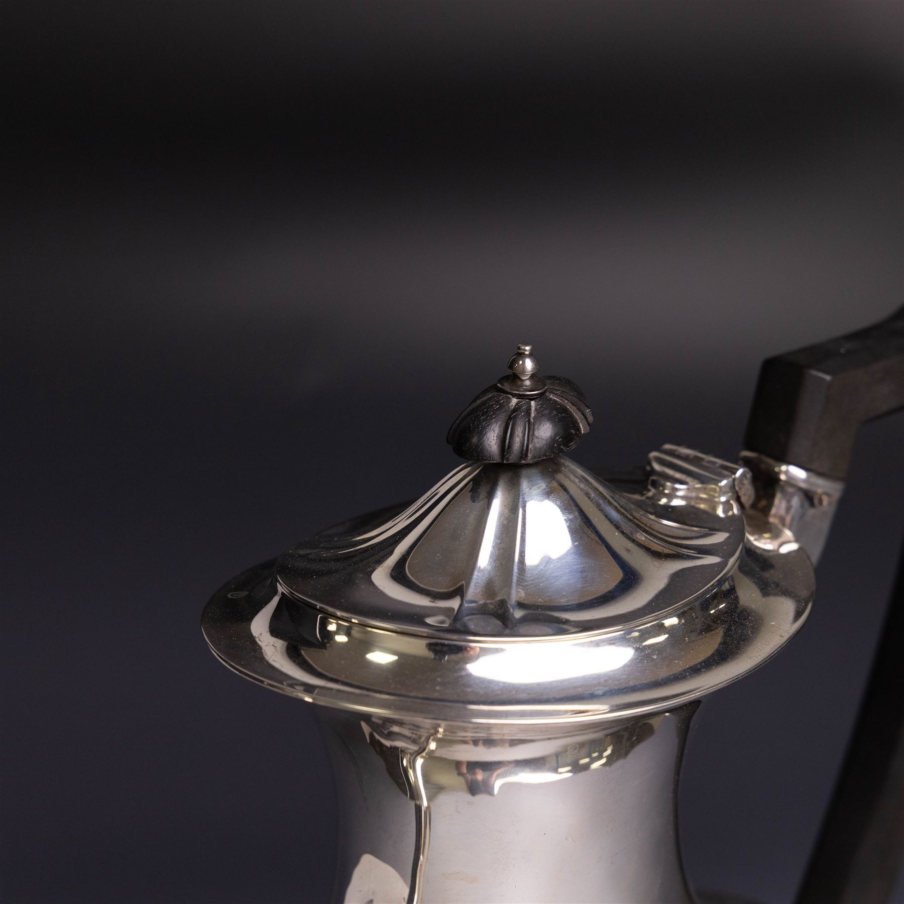 Edwardian silver coffee pot, of part fluted form with ebonised handle and finial, hallmarked Mappin & Webb Ltd, Sheffield 1908, H22cm