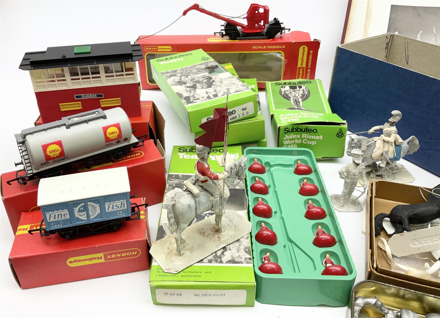 Fifty modern lead figures of mounted and foot soldiers, various period uniforms from 18th century to WW2, painted and unfinished with related paperwork; small quantity of Hornby '00' gauge model railway items and track; and four boxed Subbuteo teams etc