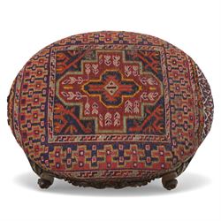 Two upholstered and caned footstools, a late Victorian carved mahogany footstool, oval form upholstered in geometric kilim-style fabric, on cabriole supports (H 27cm, W 56cm, D 47cm), together with a 20th century beech stool, square caned seat on turned supports united by stretchers (H 43cm, W 44cm, D 37cm)