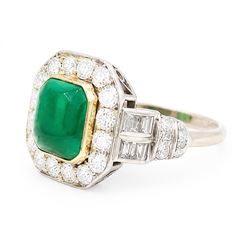 18ct white gold and platinum emerald and diamond cluster ring, single octagonal cabochon cut emerald, surrounded by sixteen milgrain set round cut diamonds, the shoulders set with baguette and single cut diamonds, stamped 18ct, total diamond weight approx 1.55 carat