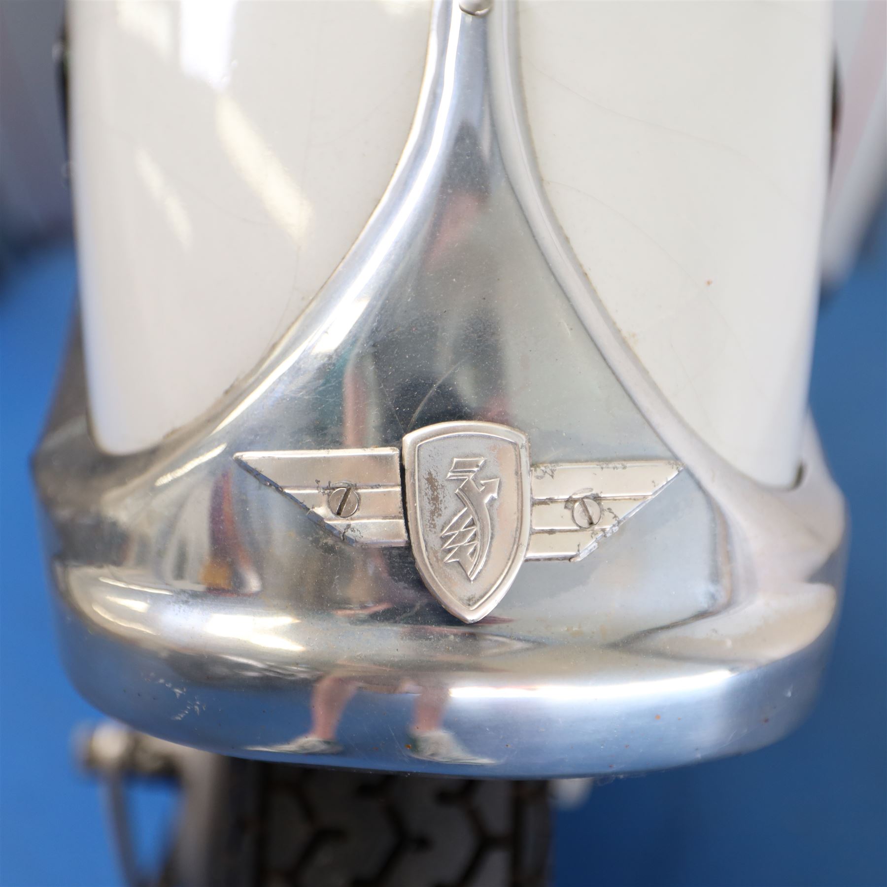 1957 Zündapp Bella R154 Scooter

• Registration: 150 KPU
• Year: 1957
• Model: Bella R154
• Engine: 150cc two-stroke single-cylinder petrol
• Transmission: Four-speed manual
• Odometer reading: 1,727 miles
• Colour: Ivory
• Seating: Dual seat
• V5C: Present
• Original registration book: Present
• Keys: 1

A characterful 1957 Zündapp Bella R154 scooter, finished in ivory with a contrasting brown dual seat and displaying an odometer reading of 1,727 miles.

The Bella R154 formed part of Zündapp’s distinctive range of German touring scooters, combining a 150cc air-cooled two-stroke engine with four-speed transmission, large wheels and substantial pressed-steel bodywork. This example retains its enclosed front apron, central headlamp, chrome handlebars, brightwork, period VDO speedometer and decorative Bella badging.

An operation and maintenance manual is include and accompanied by its V5C and original registration book from 1957.

This vehicle forms part of the Estate of the Late John Sills and is offered for sale by the Executors, confirming a genuine reason for sale.