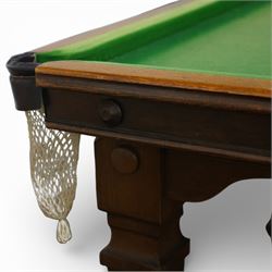 Riley - late 20th century Riley slate bed snooker table with dining table leaves, rectangular baize playing surface within a moulded hardwood frame with studded frieze rails and leather pocket mounts with net bags, raised on four square tapering fluted supports with block feet, with associated dining table leaves, with various cues, chalks, snooker and eight ball pools