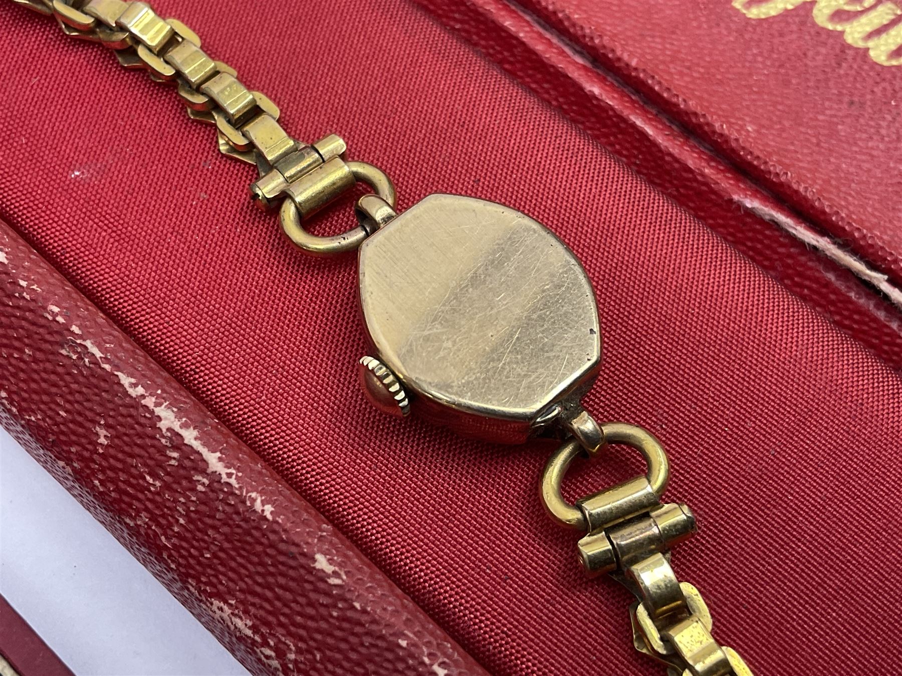 Ladies Accurist 9ct gold manual wind wristwatch, on gilt metal bracelet, together with a silver and enamel fob, for the Transport and General Workers Union, with personal engraving to reverse, hallmarked, a safe driving medal and a Quartz wristwatch