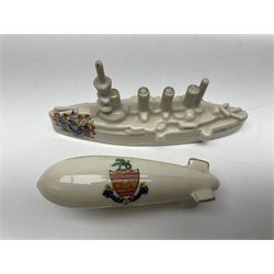 Ten WW1 crested china military models comprising submarine, four ships including Lusitania, four Zeppelins/balloons and an aircraft; various makers including Arcadian China, Swan China, Carlton China, Waterfall, Grafton China etc; various crests including Saint Neots, Great Yarmouth, Tewksbury, Swanage, Simons Town, Hull etc (10)