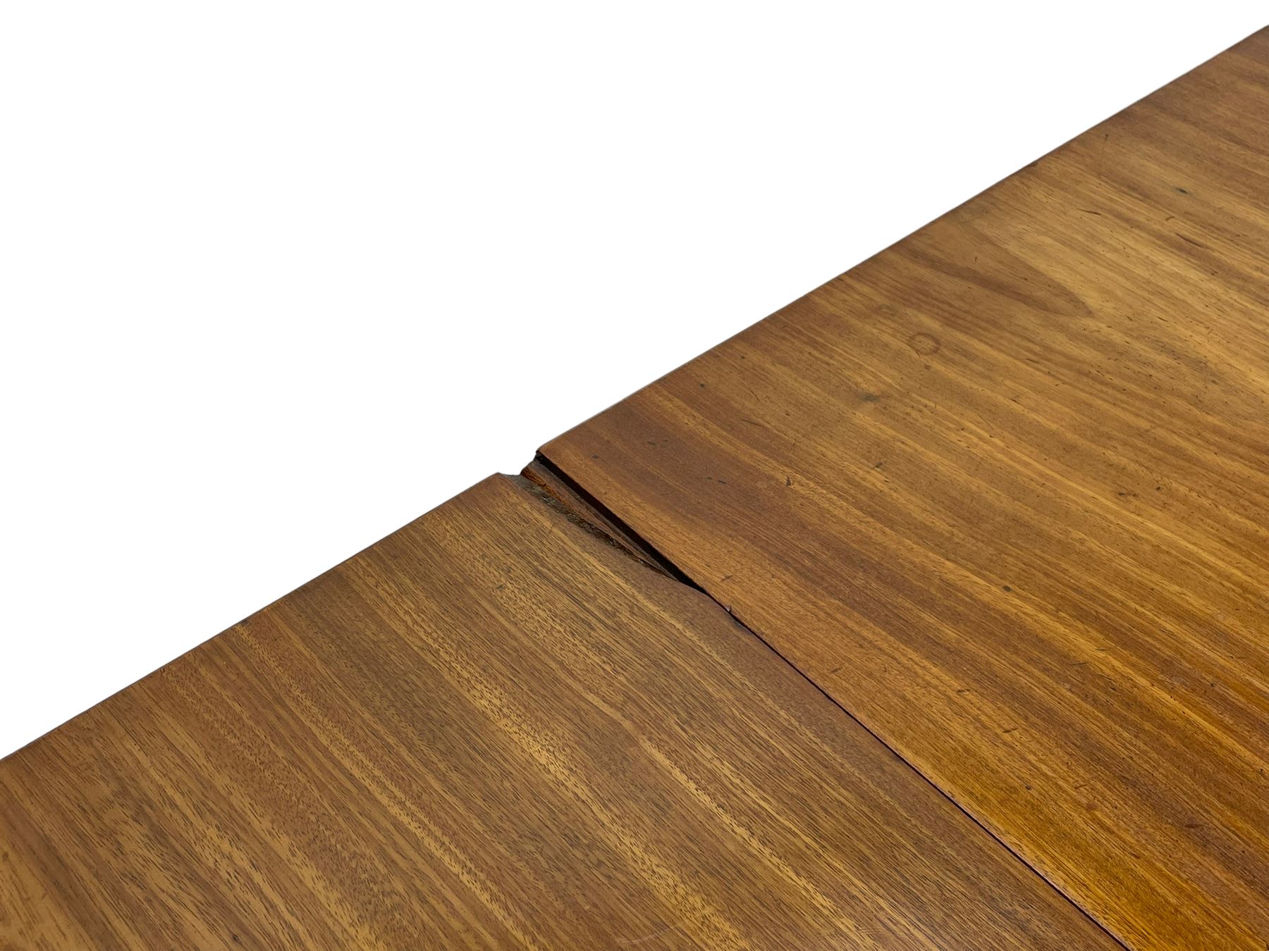 George III mahogany sofa table, rectangular drop-leaf top with reed moulded edge and rounded corners, fitted with two frieze drawers and two opposing false drawers, quadruple collar turned pillar supports on turned and block platforms, splayed and moulded supports with brass cups and castors 