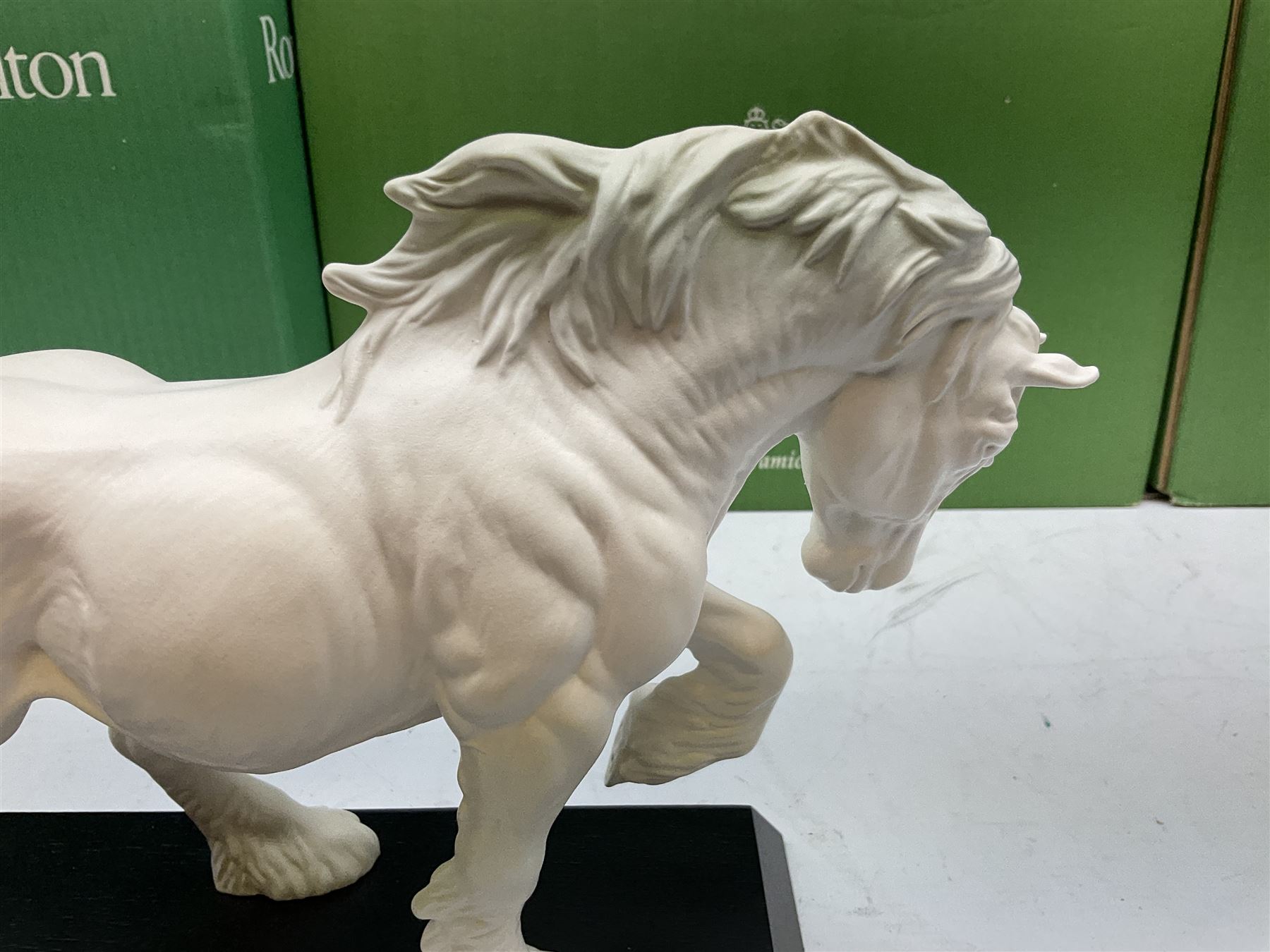 Five Beswick and Royal Doulton horse figures in matt white on black plinths, comprising of  Spirit of Affection no. 2689/2536, Springtime no.2837, Spirit of peace no.2916, Spirit of earth no.2914 and Spirit of the wild no. 183, together with a composite figure of a horse (6)