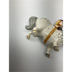 A Beswick equestrian figure modelled as a huntsman on bay horse, with printed mark beneath, together with a Beswick Norman Thelwell figure of a pony and rider, with printed mark beneath  