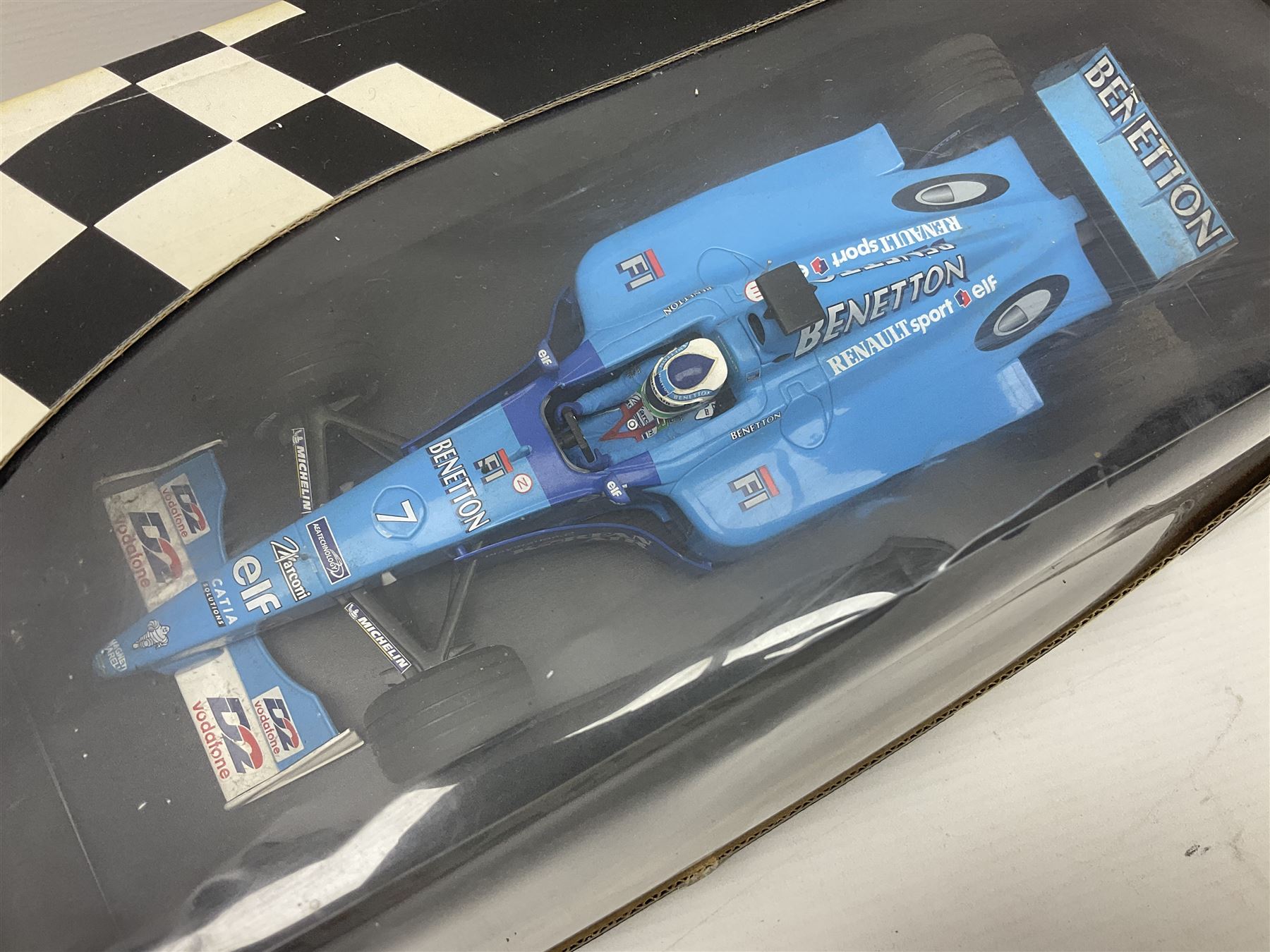 Three Minichamps 1:18 scale die-cast racing cars - B.A.R. Honda 006 J. Button; limited edition Benetton Renault Sport Showcar 2001 J. Button; and limited edition Benetton Renault Sport Showcar 2001 G. Fisichella; all boxed (3)