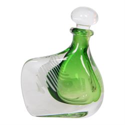 Michael James Hunter Twists Scottish glass paperweight topped with white and green lizard, signed to base, together with Karlin Rushbrooke studio glass,  Wedge Bottle in green and white, bottle H19cm