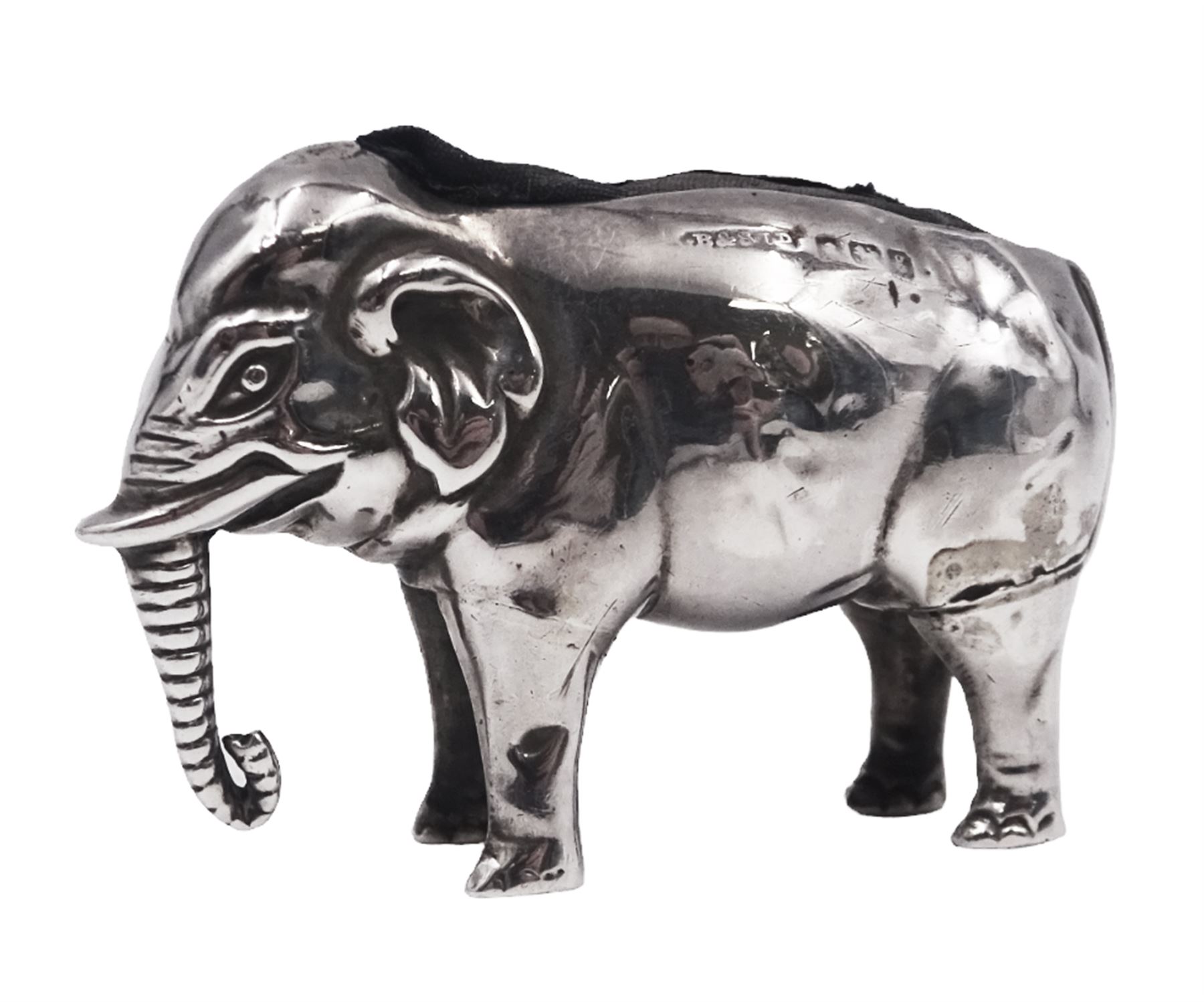 Edwardian silver novelty pin cushion, modelled as an elephant with cushioned back, hallmarked Birmingham 1906, maker's mark indistinct, H3.2cm, approximate total weight 0.46 ozt (14.1 grams)