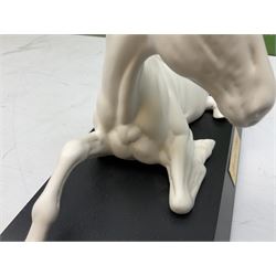 Five Beswick and Royal Doulton horse figures in matt white on black plinths, comprising of  Spirit of Affection no. 2689/2536, Springtime no.2837, Spirit of peace no.2916, Spirit of earth no.2914 and Spirit of the wild no. 183, together with a composite figure of a horse (6)