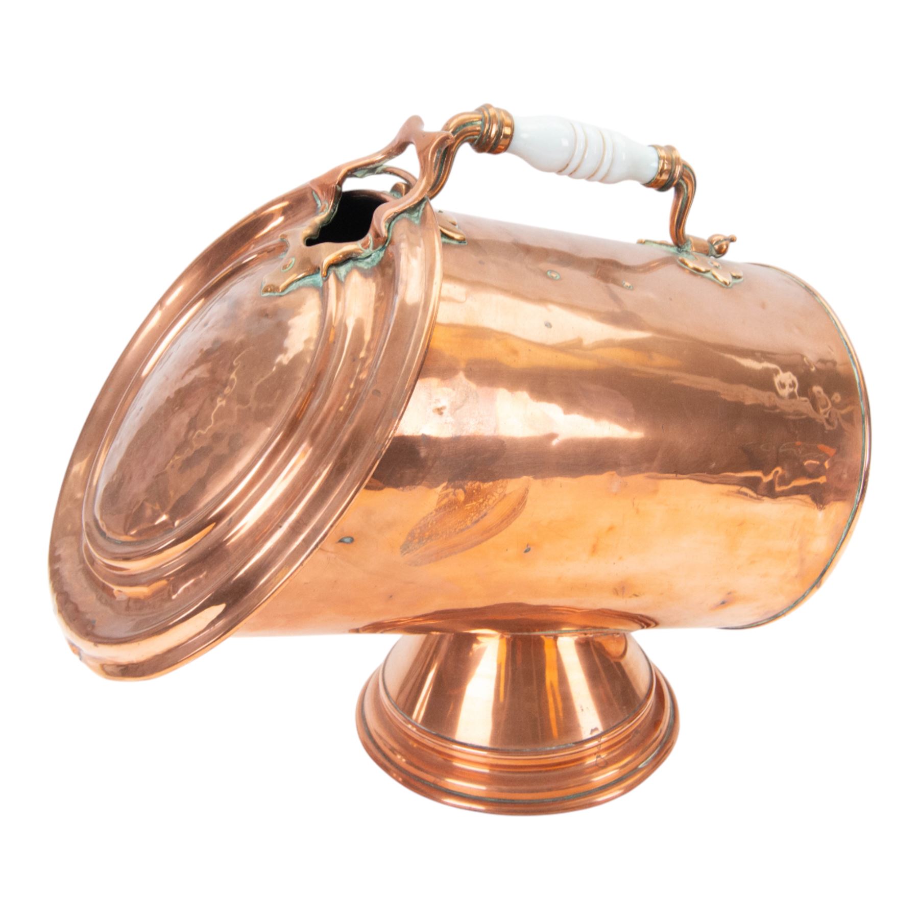 Pair of 19th century copper coal scuttles, of circular form raised on a circular stepped foot with hinged cover, H44cm, L50cm