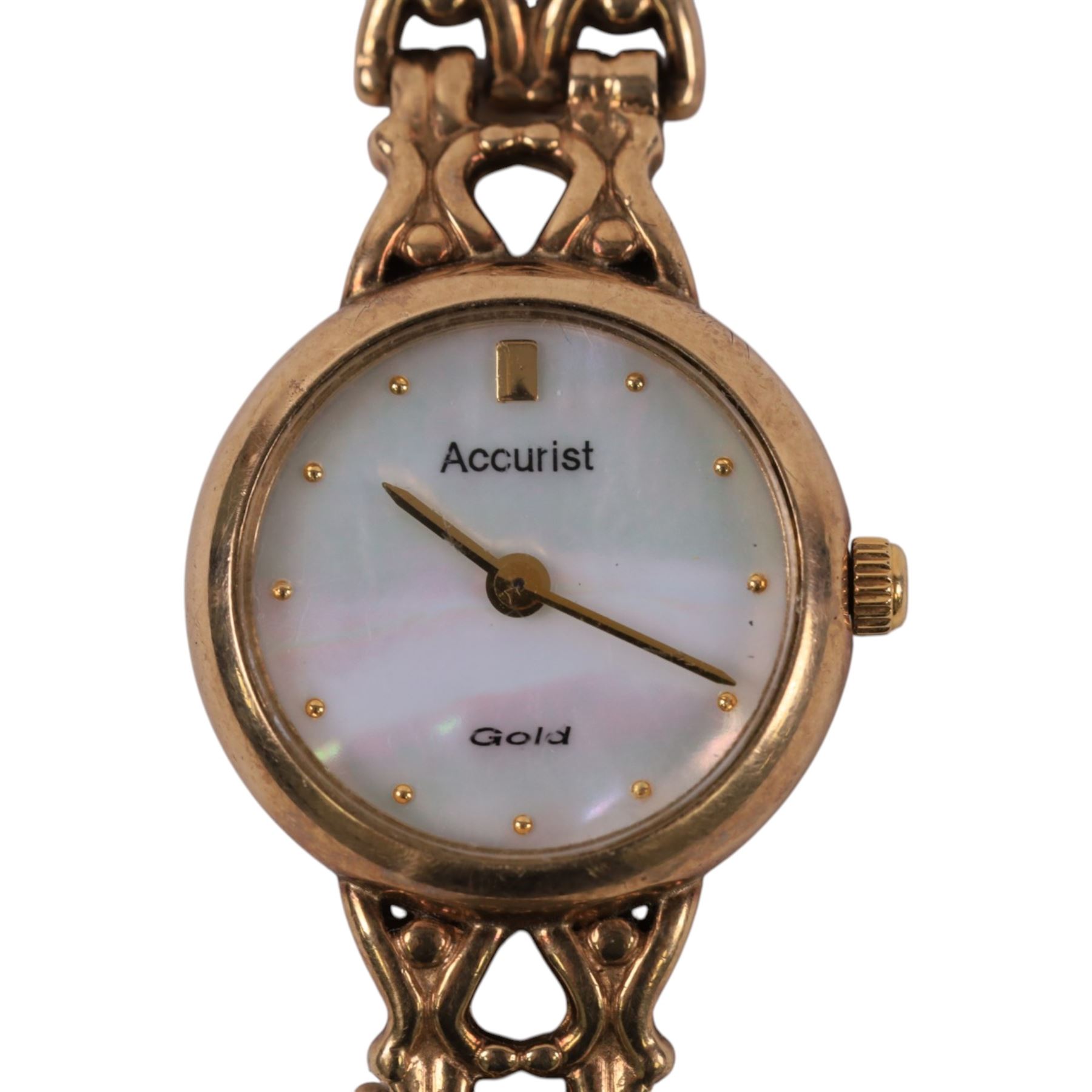 Accurist ladies 9ct gold quartz wristwatch, mother of pearl dial, on integral 9ct gold bracelet, hallmarked