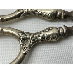 Small group of silver, to include Georgian Fiddle pattern teaspoon, later teaspoon, sugar tongs, etc., all hallmarked, approximate weighable silver 59 grams, approximate gross weight 113 grams