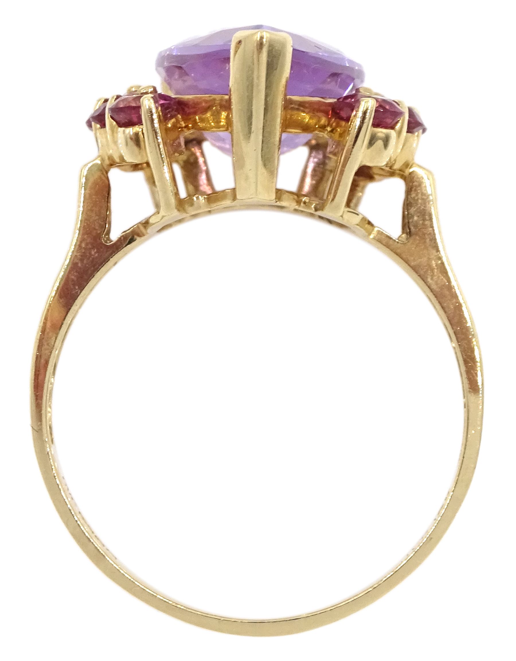 9ct gold pear shaped amethyst and eight stone flamingo topaz ring and a 14ct gold amethyst pendant with openwork mount, both hallmarked 