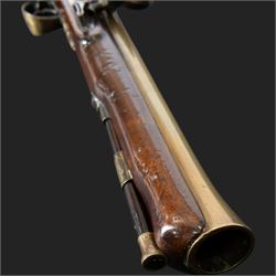 English flintlock blunderbuss, circa 1780 by R. Sutherland of London, the 32cm brass barrel with proof marks and London to the top, with original ramrod with brass tip below, the lock engraved Sutherland, walnut stock with brass butt plate, steel trigger guard with acorn finial, overall L70cm  
