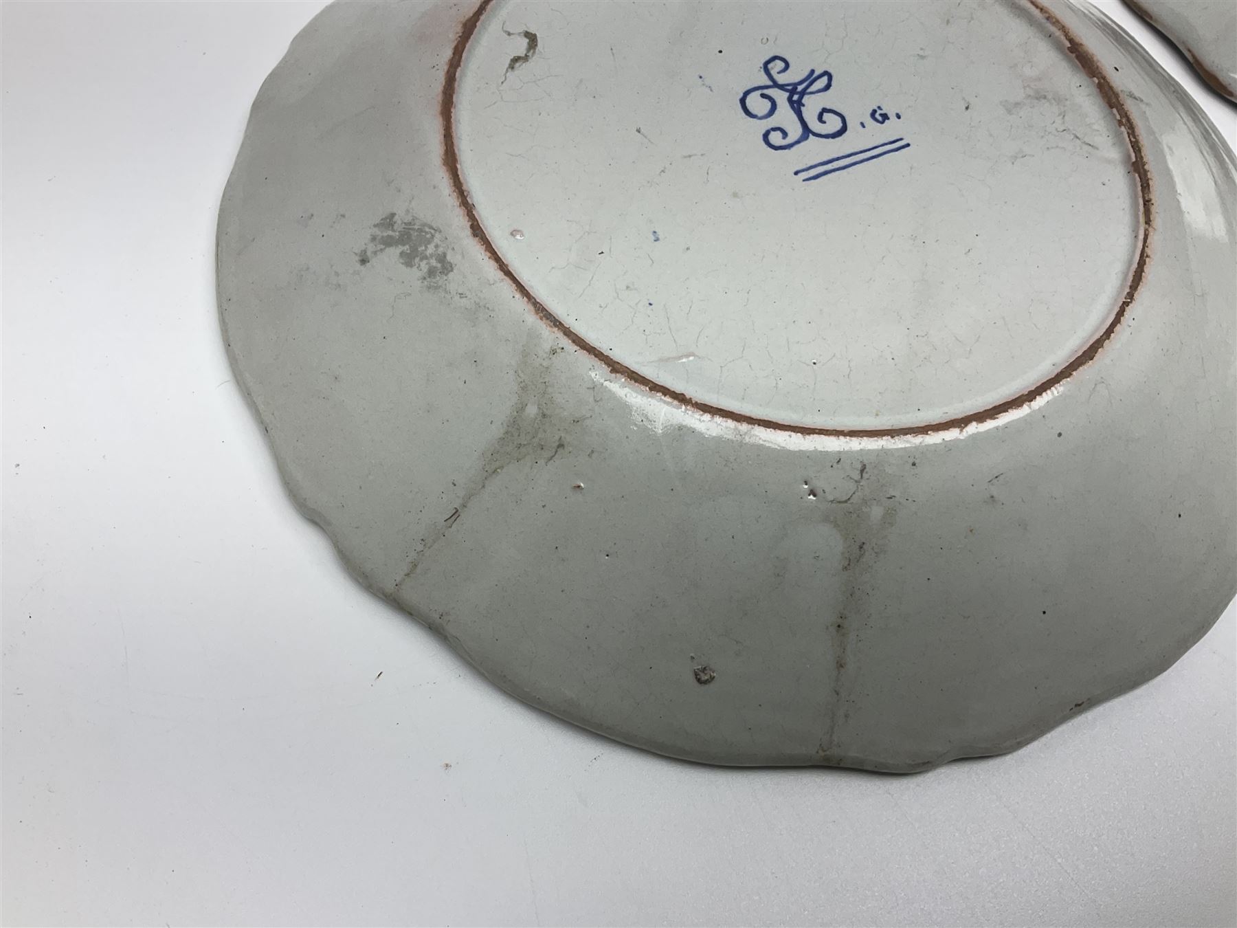 Four French Faience plates, comprising Je suis las de le porter, Le malheur nous reunit, Je desire y arriver and Eveque de Meaux, D24cm  