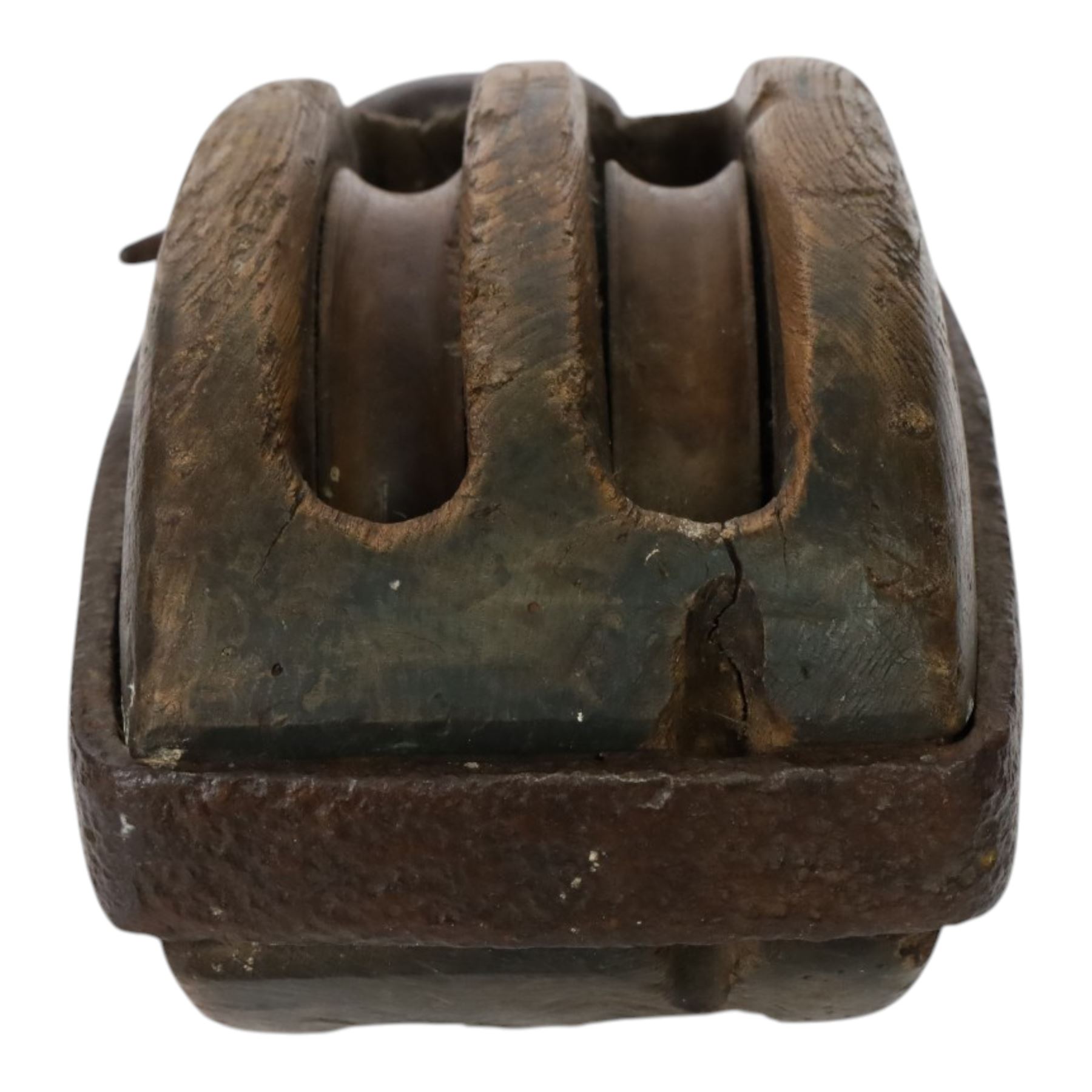 19th century double-sheave wooden pulley block in a metal casing, fitted with an iron hook, stamped GIS to one side, including hook L36cm