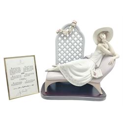 Lladro figure, Garden of Dreams, modelled as a woman reclining in front of trellis of flowers on a mahogany base, limited edition 2726/4000, sculpted by  José Puche, with original box, no 7634, year issued 1994, year retired 1996, H32cm