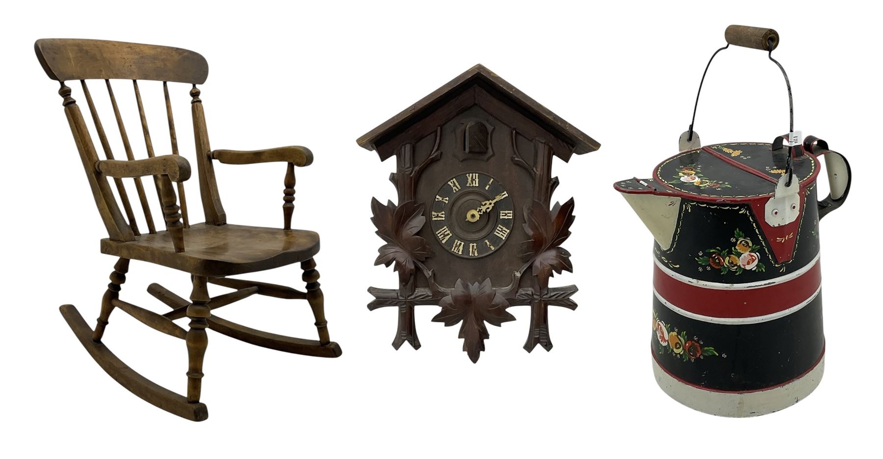 19th century child's rocking chair; heavily carved cuckoo clock; canal buckby can hand painted with floral motifs (3)